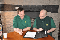 E F Fca A A Ba Ef F D Two men at a table